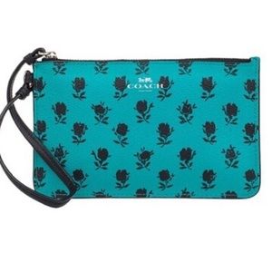 Coach turquoise wristlet Black Roses print